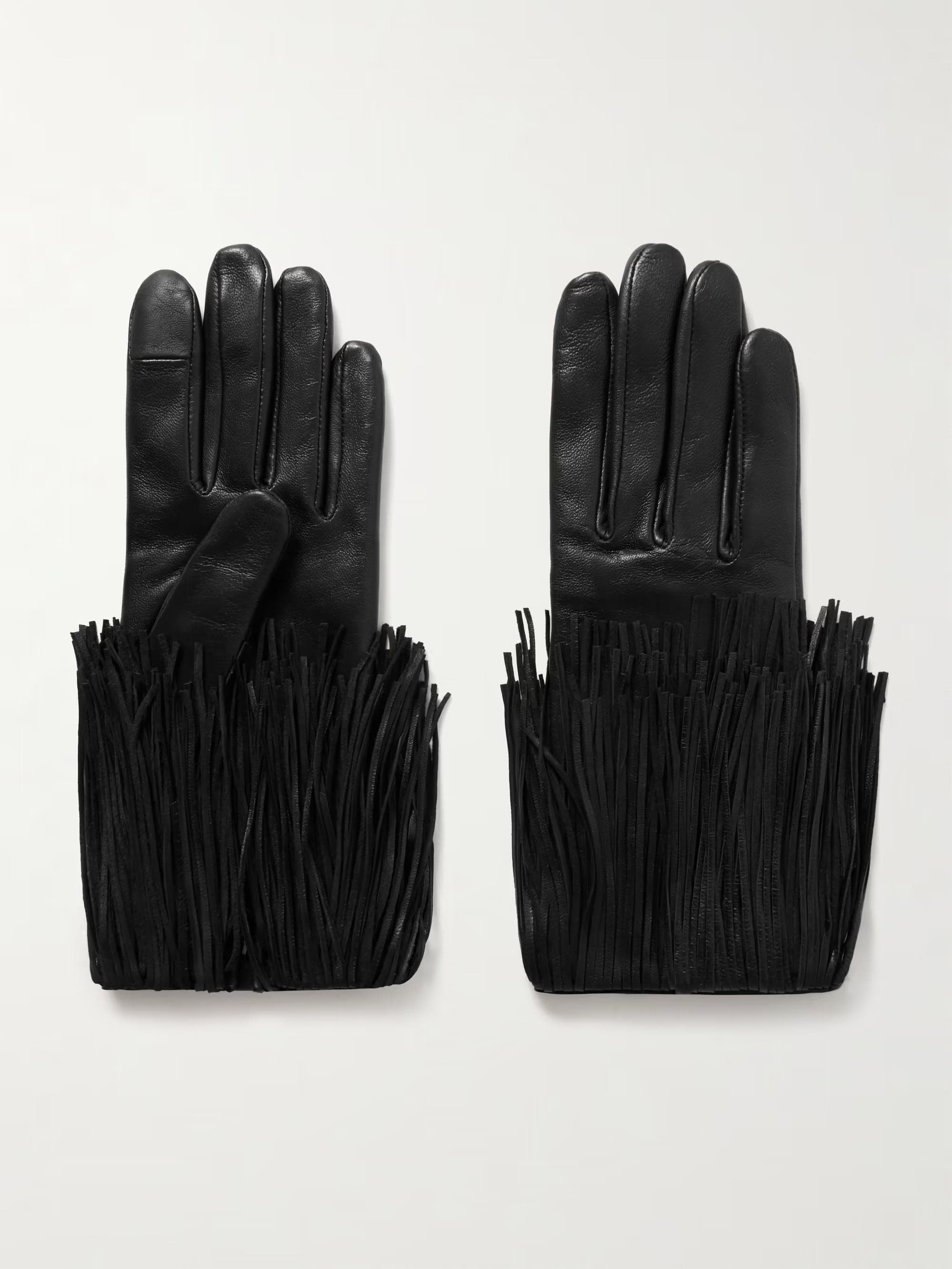 a pair of black leather gloves laid flat side by side, palm and back, with a deep black fringe at each wrist