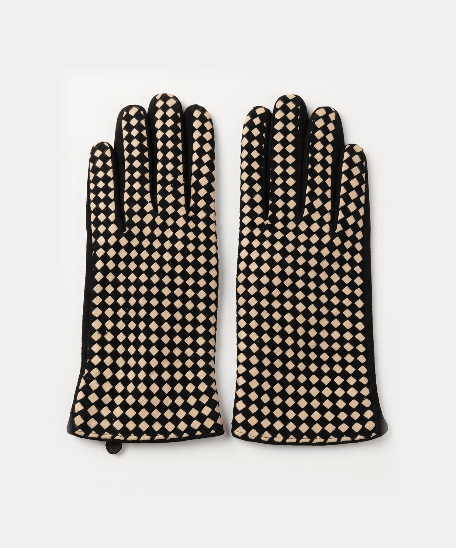 black suede gloves with a cream checkerboard across the back of the hand and fingers, laid flat
