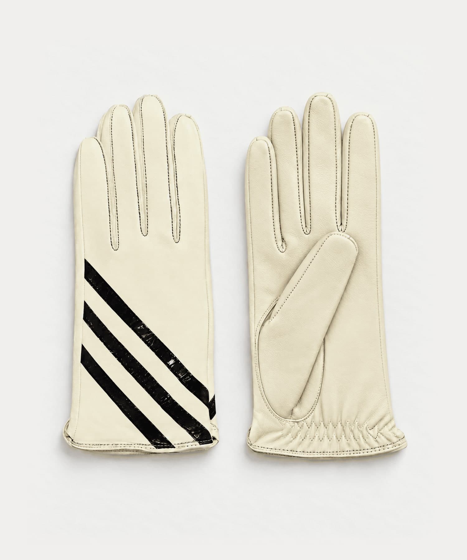 cream nappa leather gloves with three glossy black diagonal stripes, front